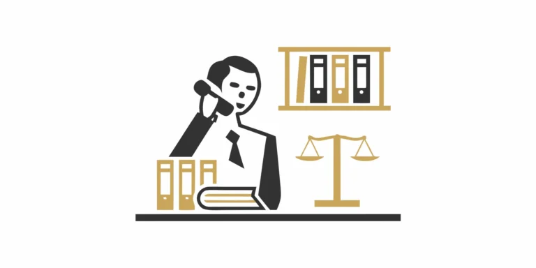 A slip and fall lawyer at their desk reviewing documents to build a client's case.