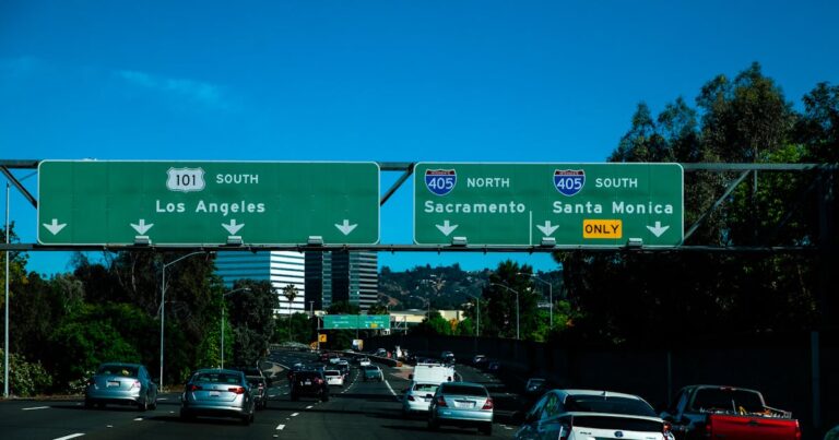 Vehicles in the freeway during daytime traffic