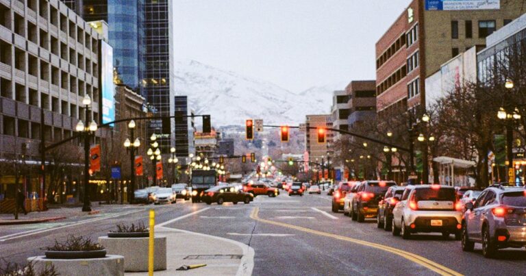 Cars at intersection in city during daytime