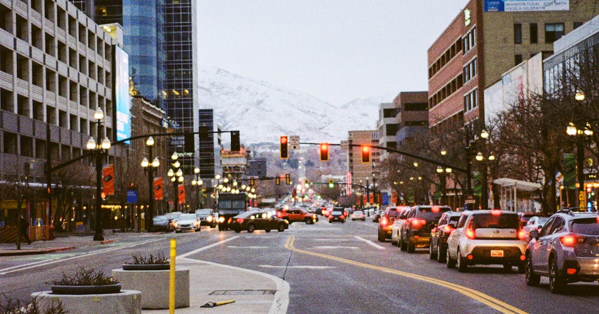 Cars at intersection in city during daytime