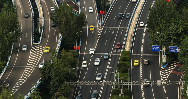 Aerial view of busy urban highway intersection