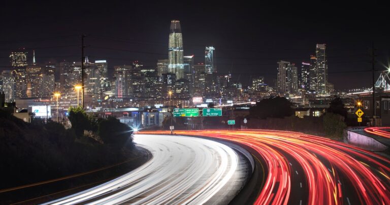 City road lights at night leading to urban area